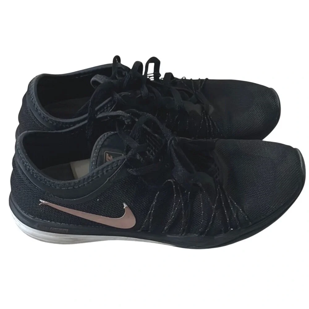 Nike Black and Rose Gold Athletic Shoes‎ with Sleek Design